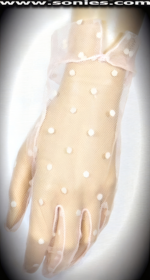 Seriously distracting in these Parilia luxurious wrist length stretch mesh gloves with cotton dots and vent at cuff detail finish. Adds an elegant touch to your attire. Dainty mesh gloves have a playful ambiance, much more so than formal opera length gloves. This style is perfect for formal, bridal, prom, d�butante and Opera Ball.   Style: MFG-72821