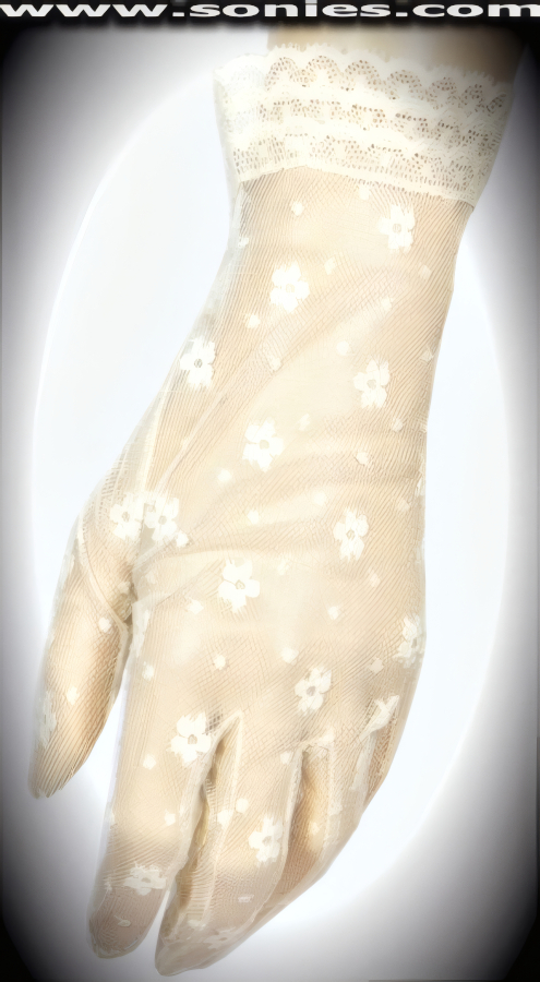Sexy show girl in these legendary Libitina wrist length floral and dotted lace gloves with ruffle cuff detail finish. Dainty lace gloves have a playful ambiance, much more so than formal opera length gloves. This style is perfect for formal, bridal, prom, d�butante and Opera Ball.   Style: MFG-72823