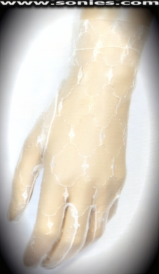 Set his dormant heart a beating in these Achaia elegant wrist length elaborate stretch lace gloves. Adds an elegant touch to your attire. Dainty mesh gloves have a playful ambiance, much more so than formal opera length gloves. This style is perfect for formal, bridal, prom, d�butante and Opera Ball.   Style: MFG-72835