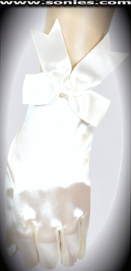 Delight any audience in these irresistibly crafted Acca wrist length satin Lycra gloves with large satin bow on cuff detail finish (15% Lycra, 85% Nylon). It pairs beautifully with any number of vestures. This style is perfect for formal, bridal, prom, d�butante and Opera Ball.   Style: MFG-72842B