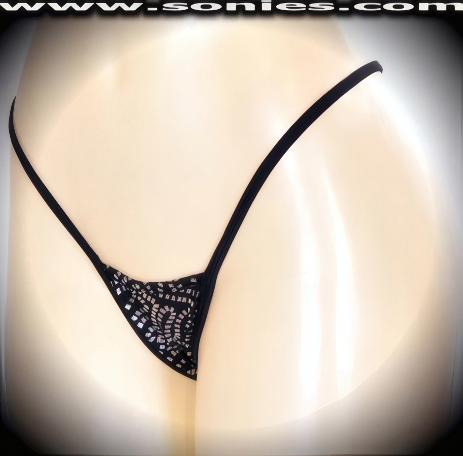Splendid Aim�e stretch silver Aztec swirl glitter hologram Lycra center stage micro dance wear bottom with lined crotch and thong back detail finish (15% Lycra, 85% Nylon exclusive of trim. Hand wash cold and drip dry, no bleach). It pairs beautifully with any number of risqu� tops. May be worn with stiletto heel shoes or boots to create a phenomenal look. This style is perfect for stage, bedroom performance, life style events, pride week, monthly play parties, fetish events, adult alternative lifestyle gatherings, bachelor parties, club wear, nightclubs, dance clubs and gentleman's clubs.   Style: MTHONG04