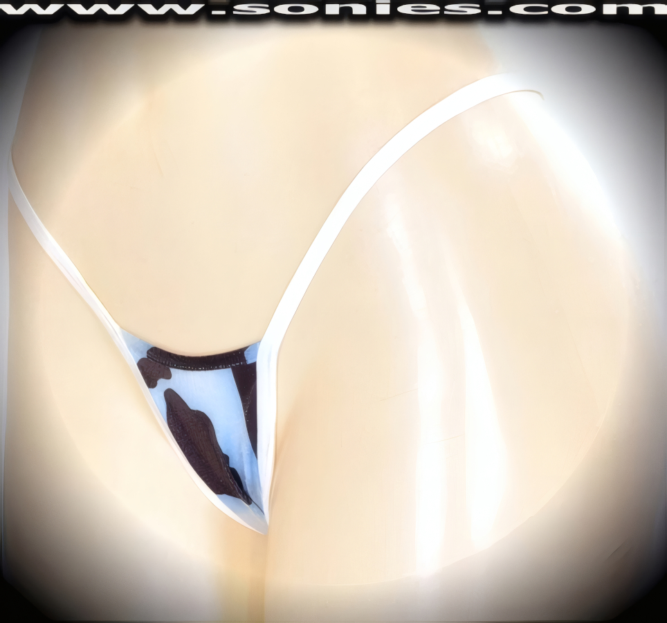 Look terrific in this June stretch foil psychedelic cow print Lycra center stage micro dance wear bottom with lined crotch and thong back detail finish (15% Lycra, 85% Nylon exclusive of trim. Hand wash cold and drip dry, no bleach). It pairs beautifully with any number of risqu� tops. May be worn with stiletto heel shoes or boots to create a phenomenal look. This style is perfect for stage, bedroom performance, life style events, pride week, monthly play parties, fetish events, adult alternative lifestyle gatherings, bachelor parties, club wear, nightclubs, dance clubs and gentleman's clubs.   Style: MTHONG15