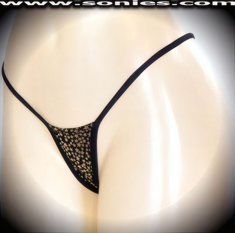 Marvelous Akhmatova foil gold stars stretch Lycra center stage micro dance wear bottom with lined crotch and thong back detail finish (15% Lycra, 85% Nylon exclusive of trim. Hand wash cold and drip dry, no bleach). It pairs beautifully with any number of risqu� tops. May be worn with stiletto heel shoes or boots to create a phenomenal look. This style is perfect for stage, bedroom performance, life style events, pride week, monthly play parties, fetish events, adult alternative lifestyle gatherings, bachelor parties, club wear, nightclubs, dance clubs and gentleman's clubs.   Style: MTHONG17