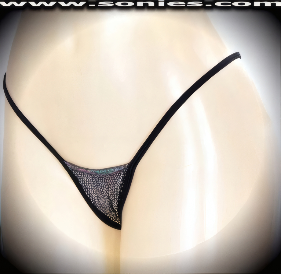 Unparalleled Albright foil silver raindrops stretch Lycra center stage micro dance wear bottom with lined crotch and thong back detail finish (15% Lycra, 85% Nylon exclusive of trim. Hand wash cold and drip dry, no bleach). It pairs beautifully with any number of risqu� tops. May be worn with stiletto heel shoes or boots to create a phenomenal look. This style is perfect for stage, bedroom performance, life style events, pride week, monthly play parties, fetish events, adult alternative lifestyle gatherings, bachelor parties, club wear, nightclubs, dance clubs and gentleman's clubs.   Style: MTHONG30
