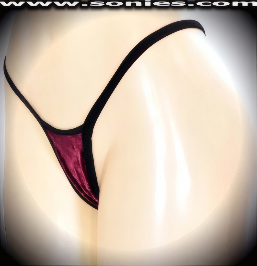 Groove the night away in this illustrious Fortuna crushed velvet center stage micro dance wear bottom with black contrasting stretch Lycra binding to ensure a great fit. Crafted with a lined crotch and thong back detail finish (15% Lycra, 85% Nylon exclusive of trim. Hand wash cold and drip dry, no bleach). It pairs beautifully with any number of risqu� tops. May be worn with stiletto heel shoes or boots to create a phenomenal look. This style is perfect for stage, bedroom performance, life style events, pride week, monthly play parties, fetish events, adult alternative lifestyle gatherings, bachelor parties, club wear, nightclubs, dance clubs and gentleman's clubs.   Style: MTHONG58