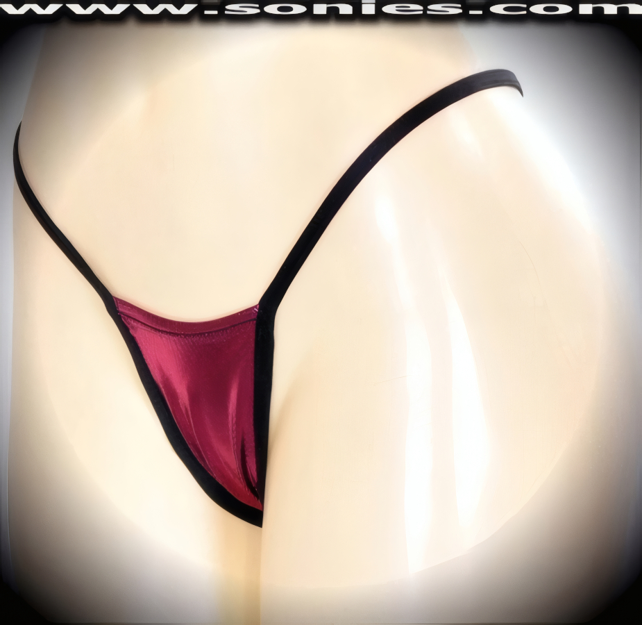 Demand some attention in this Cayambe glimmer star dust foil micro dance wear bottom with black contrasting stretch Lycra binding to ensure a great fit. Crafted with a lined crotch and thong back detail finish (15% Lycra, 85% Nylon exclusive of trim. Hand wash cold and drip dry, no bleach). It pairs beautifully with any number of risqu� tops. May be worn with stiletto heel shoes or boots to create a phenomenal look. This style is perfect for stage, bedroom performance, life style events, pride week, monthly play parties, fetish events, adult alternative lifestyle gatherings, bachelor parties, club wear, nightclubs, dance clubs and gentleman's clubs.   Style: MTHONG60