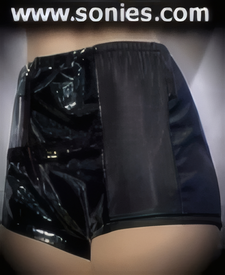 Let Yourself Go Wild in Our Patent Leather Croc Print and Solid Hot Pant. Horizontal Sheer Black Lace Contrast Front with Zip-Up Closure.   STYLE: SC-14AA