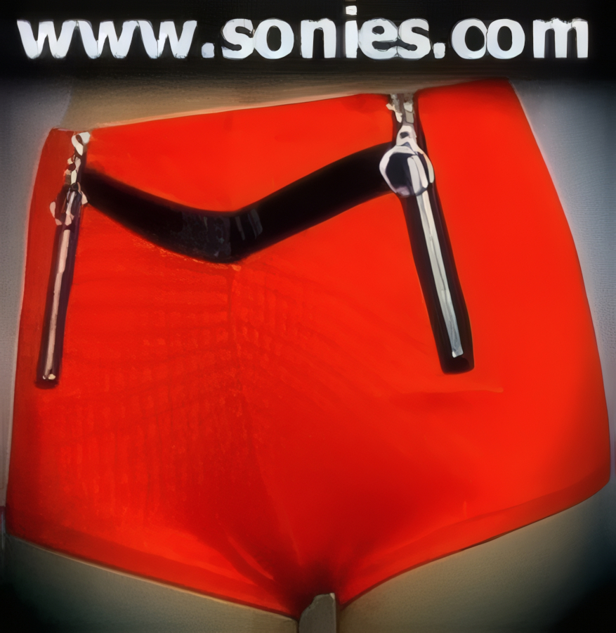 Give him a glimpse of your charms in this groovy Primavera waffle stretch Lycra hot pants with contrasting eye-enchanting velvet V-front to create an impressive look. Crafted with a tantalizing dual front aluminum metal biker zipper detailing, plus metal O-ring puller finally for added peek-a-boo teasing effect. The low rise design makes the torso look longer, while the high-cut thigh elongates the legs, for an incredibly seductive silhouette (15% Lycra, 85% Nylon. Wash delicate and hang dry). It pairs beautifully with any number of risqu� tops. May be worn with stiletto heel shoes or boots to create a phenomenal look. This style is perfect for stage, life style events, pride week, monthly play parties, fetish events, adult alternative lifestyle gatherings, bachelor parties, club wear, nightclubs, dance clubs and gentleman's clubs.   STYLE: SC-14AH