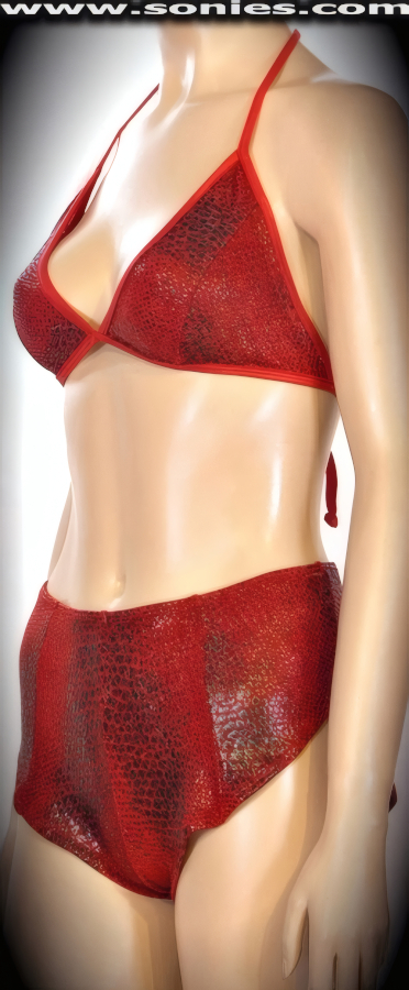 Blissful Contentment in this audience hypnotic Jungfrau stretch slinky Lycra python print three piece set. Contour seaming triangle top that is designed to fit all busts and adjustable tie straps. Complementing curve hugging pull-on cheeky hot pants. The low rise design makes the torso look longer, while the high-cut thigh elongates the legs, for an incredibly seductive silhouette. Includes a matching lined thong back panty to complete this magnificent vesture (15% Lycra, 85% Nylon). It pairs beautifully with any number of risqu� gloves. May be worn with stiletto heel shoes or boots to create a phenomenal look. This style is perfect for stage, life style events, pride week, monthly play parties, fetish events, adult alternative lifestyle gatherings, bachelor parties, club wear, nightclubs, dance clubs and gentleman's clubs.   Style: SC-16C