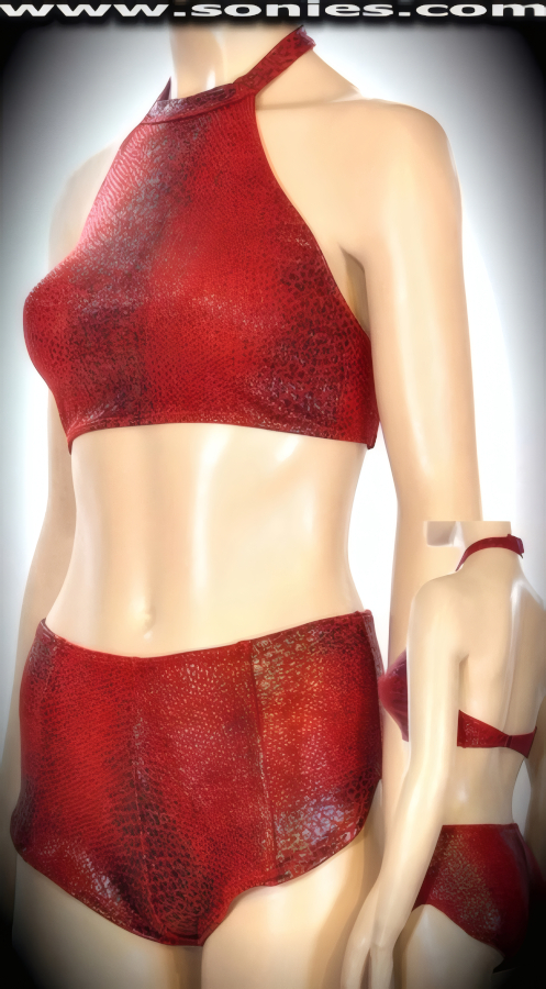 Party the night away in this magnetizing Thuban three piece stretch Lycra python print slinky set. Conforming fit halter style crop top with adjustable Velcro neck close to ensure a great fit, plus rear clasp closure for off and on ease detail finish. Complementing curve hugging pull-on cheeky hot pants. The low rise design makes the torso look longer, while the high-cut thigh elongates the legs, for an incredibly seductive silhouette. Includes a matching lined thong back panty to complete this magnificent vesture (15% Lycra, 85% Nylon). May be worn with stiletto heel shoes or boots to create a phenomenal look. This style is perfect for stage, life style events, pride week, monthly play parties, fetish events, adult alternative lifestyle gatherings, bachelor parties, club wear, nightclubs, dance clubs and gentleman's clubs.   Style: SC-16D