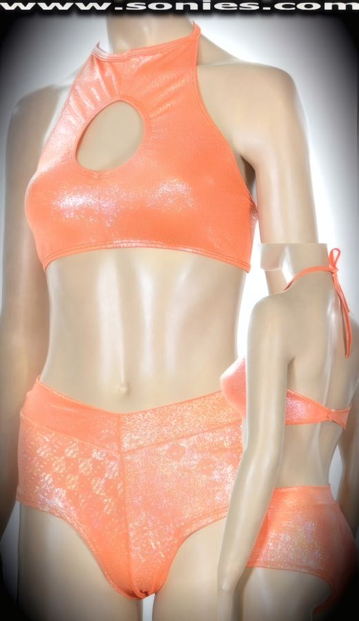 Knock out your competition wearing this Cordillera well-sculpted three piece stretch glimmer silver foil Lycra set. Curvature hugging halter style crop top with skin baring keyhole front, adjustable tie neck spaghetti straps to ensure a great fit, plus rear hook closure for off and on ease detail finish. Complementing hip hugging pull-on V-front cheeky hot pants. Includes a matching thong back center stage micro dance wear panty with lined crotch to complete this magnificent vesture (15% Lycra, 85% Nylon). It pairs beautifully with any number of risqu� gloves. May be worn with stiletto heel shoes or boots to create a phenomenal look. This style is perfect for stage, life style events, pride week, monthly play parties, fetish events, adult alternative lifestyle gatherings, bachelor parties, club wear, nightclubs, dance clubs and gentleman's clubs.   Style: SC-16M