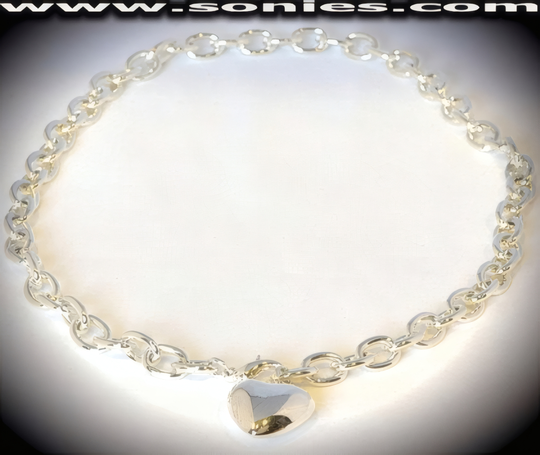Awe-inspiring Anodized Silver Oval Link Necklace with Center Heart Detail Finish to create a more Stunning effect. Secure and attractive Lobster Claw Clasp Finally. 18-Inch Length.   STYLE: SJN-08H