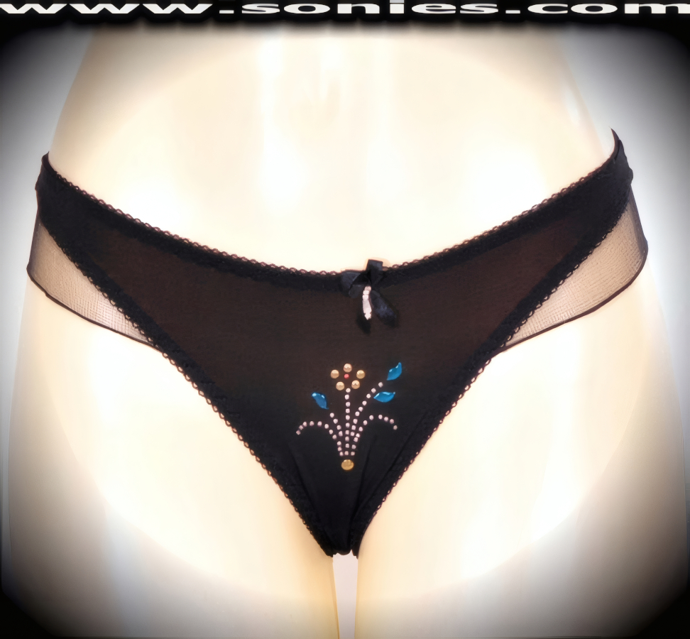Sexy as an underpinning, stunning when worn alone in this spirited adult entertainer's low-rise Diran stretch Lycra with silky soft mesh hip sides dance wear thong bottom. Irresistibly enticing panty features a stunning glitter metallic flower foil center front, cotton lined crotch, soft elasticized edging to insure a comfortable fit, plus a satin bow appliqu� with bead adornment detailing finish (10% Lycra, 90% Nylon. Wash delicate and hang dry). It pairs beautifully with any number of risqu� tops. May be worn with stiletto heel shoes or boots to create a phenomenal look. This style is perfect for stage, bedroom performance, life style events, pride week, monthly play parties, fetish events, adult alternative lifestyle gatherings, bachelor parties and gentleman's clubs.   Style: YQ613B
