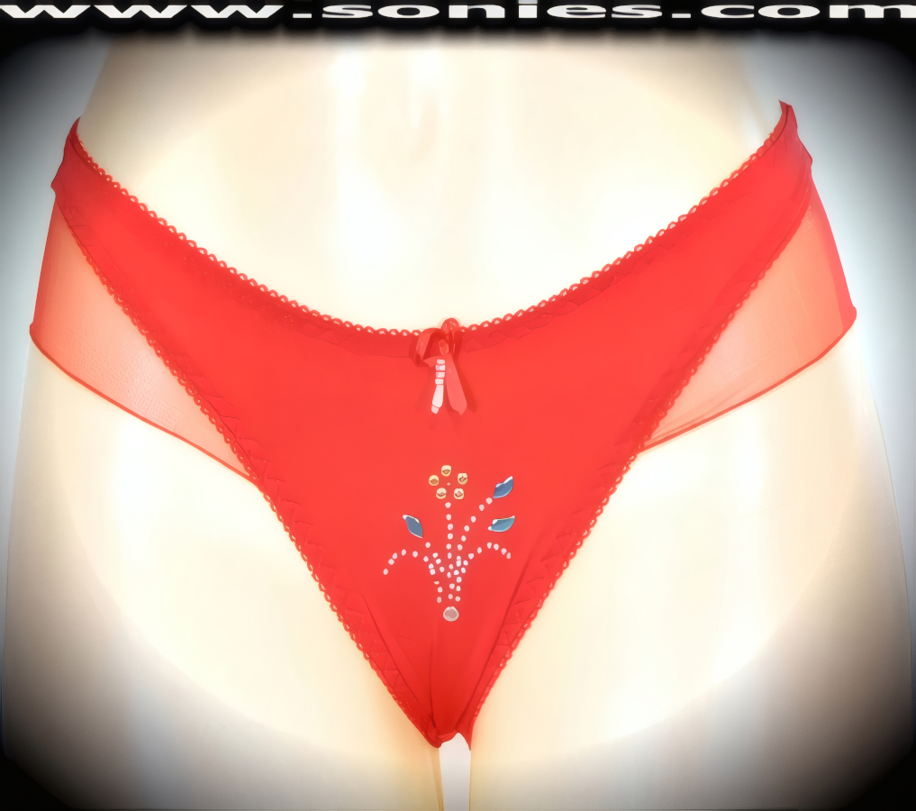 Sexy as an underpinning, stunning when worn alone in this spirited adult entertainer's low-rise Diran stretch Lycra with silky soft mesh hip sides dance wear thong bottom. Irresistibly enticing panty features a stunning glitter metallic flower foil center front, cotton lined crotch, soft elasticized edging to insure a comfortable fit, plus a satin bow appliqu� with bead adornment detailing finish (10% Lycra, 90% Nylon. Wash delicate and hang dry). It pairs beautifully with any number of risqu� tops. May be worn with stiletto heel shoes or boots to create a phenomenal look. This style is perfect for stage, bedroom performance, life style events, pride week, monthly play parties, fetish events, adult alternative lifestyle gatherings, bachelor parties and gentleman's clubs.   Style: YQ613I
