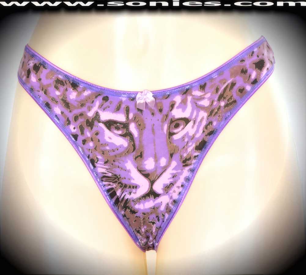 Nowhere for your audience to hide when you step-out in this sexy adult entertainer's low-rise Distaghil soft stretch leopard print dance wear thong bottom. Irresistibly enticing panty features a cotton lined crotch, soft elasticized edging to insure a comfortable fit, plus front satin bow appliqu� accent detail finish (10% Lycra, 90% Nylon. Wash delicate and hang dry). It pairs beautifully with any number of risqu� tops. May be worn with stiletto heel shoes or boots to create a phenomenal look. This style is perfect for stage, bedroom performance, life style events, pride week, monthly play parties, fetish events, adult alternative lifestyle gatherings, bachelor parties and gentleman's clubs.   Style: YQ617E