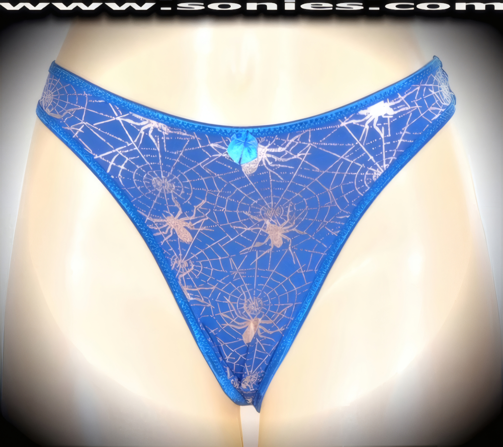 Make it a stage show night to remember in this sensational adult entertainer's low-rise Haramosh stretch Lycra with silver metallic foil spider print dance wear thong bottom. Irresistibly enticing panty features a cotton lined crotch, soft elasticized edging to insure a comfortable fit, plus a satin bow appliqu� front detailing finish (10% Lycra, 90% Nylon. Wash delicate and hang dry). It pairs beautifully with any number of risqu� tops. May be worn with stiletto heel shoes or boots to create a phenomenal look. This style is perfect for stage, bedroom performance, life style events, pride week, monthly play parties, fetish events, adult alternative lifestyle gatherings, bachelor parties and gentleman's clubs.   Style: YQ630D