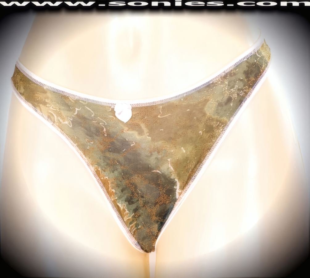Pay homage to the era of excess in this over-the-top sexy adult entertainer's low-rise Kunyang water-color stretch Lycra with picturesque gold glitter foil print dance wear thong bottom. Irresistibly enticing panty features a cotton lined crotch, soft elasticized edging to insure a comfortable fit, plus a satin bow appliqu� front detailing finish (10% Lycra, 90% Nylon. Wash delicate and hang dry). It pairs beautifully with any number of risqu� tops. May be worn with stiletto heel shoes or boots to create a phenomenal look. This style is perfect for stage, bedroom performance, life style events, pride week, monthly play parties, fetish events, adult alternative lifestyle gatherings, bachelor parties and gentleman's clubs.    Style: YQ664E