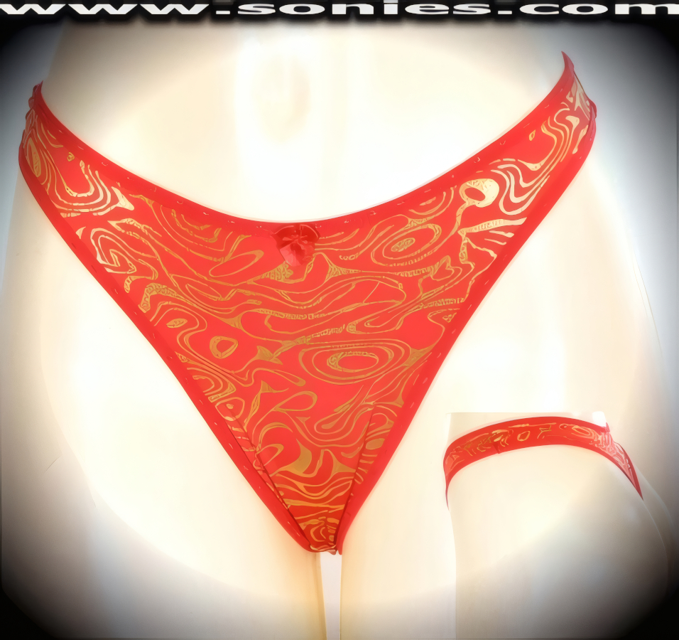 Be flirtatious in this Austria stretch Lycra dance wear bottom with gold metallic foil orbital oasis design. Crafted with a lined crotch and thong back, plus satin bow appliqu� front detail finish (10% Lycra, 90% Nylon. Wash delicate and hang dry). It pairs beautifully with any number of risqu� tops. May be worn with stiletto heel shoes or boots to create a phenomenal look. This style is perfect for stage, bedroom performance, life style events, pride week, monthly play parties, fetish events, adult alternative lifestyle gatherings, bachelor parties and gentleman's clubs.   Style: YQ670B
