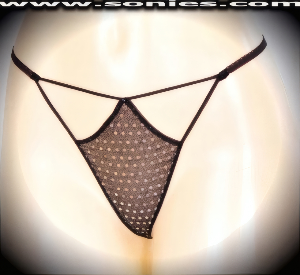 A sexy little surprise for your sweetheart, in this Lita glittery sequin with lurex front cutout panty, plus has a V-shape G-String back finally that flatters your body marvelously. Crafted with a soft elasticized waistband and back to ensure a great fit (10% Lycra, 90% Nylon, exclusive of trim. Hand wash cold and line dry. Do not bleach). It pairs beautifully with any number of risqu� tops. May be worn with stiletto heel shoes or boots to create a phenomenal look. This style is perfect for stage, bedroom performance, life style events, pride week, monthly play parties, fetish events, adult alternative lifestyle gatherings, bachelor parties and gentleman's clubs.   Style: YQ706A