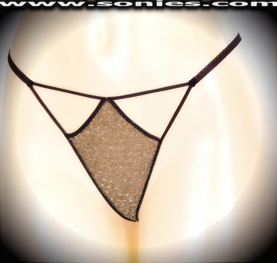 A sexy little surprise for your sweetheart, in this Lita glittery sequin with lurex front cutout panty, plus has a V-shape G-String back finally that flatters your body marvelously. Crafted with a soft elasticized waistband and back to ensure a great fit (10% Lycra, 90% Nylon, exclusive of trim. Hand wash cold and line dry. Do not bleach). It pairs beautifully with any number of risqu� tops. May be worn with stiletto heel shoes or boots to create a phenomenal look. This style is perfect for stage, bedroom performance, life style events, pride week, monthly play parties, fetish events, adult alternative lifestyle gatherings, bachelor parties and gentleman's clubs.   Style: YQ706C