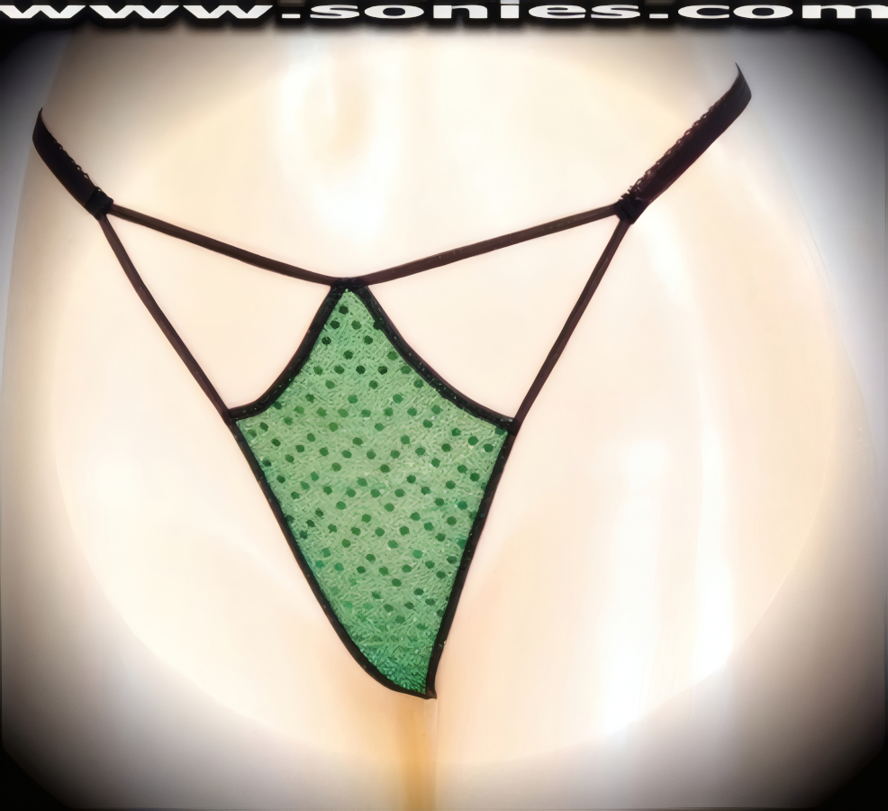 A sexy little surprise for your sweetheart, in this Lita glittery sequin with lurex front cutout panty, plus has a V-shape G-String back finally that flatters your body marvelously. Crafted with a soft elasticized waistband and back to ensure a great fit (10% Lycra, 90% Nylon, exclusive of trim. Hand wash cold and line dry. Do not bleach). It pairs beautifully with any number of risqu� tops. May be worn with stiletto heel shoes or boots to create a phenomenal look. This style is perfect for stage, bedroom performance, life style events, pride week, monthly play parties, fetish events, adult alternative lifestyle gatherings, bachelor parties and gentleman's clubs.   Style: YQ706D