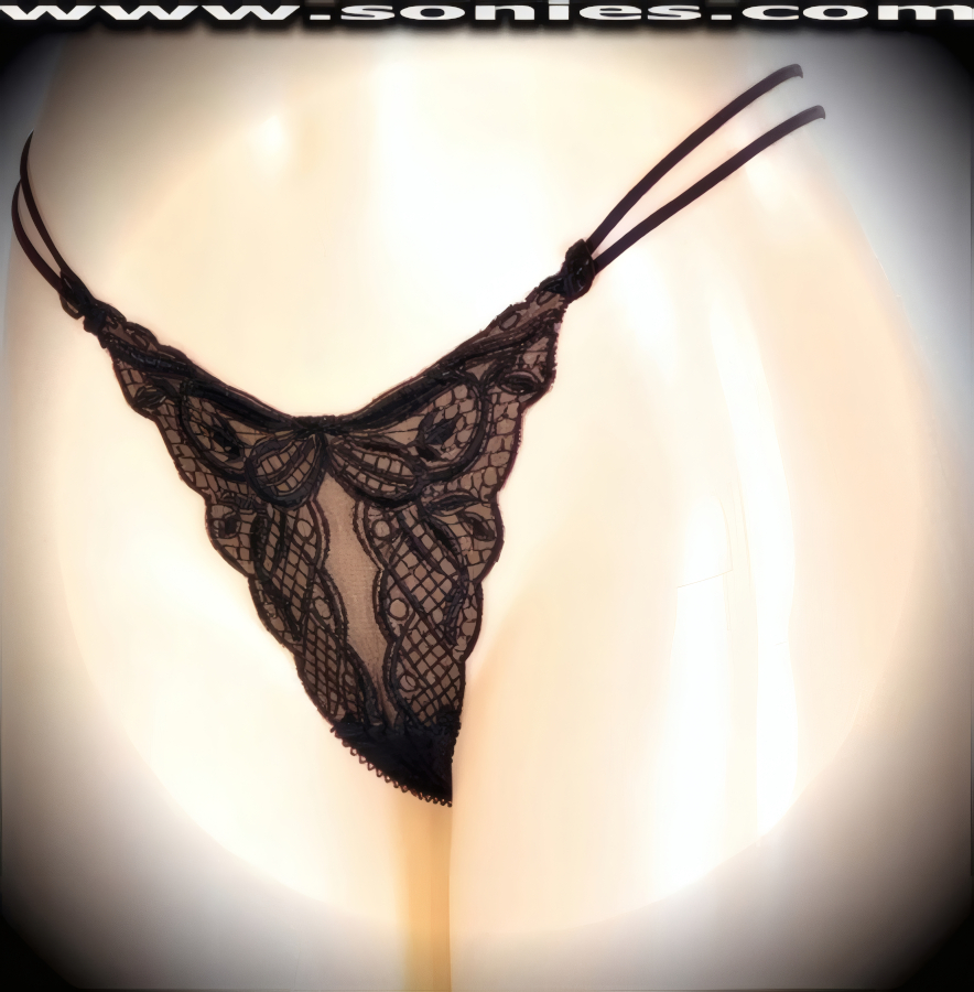 Pure Delight in this Ladies Translucent Stretch Mesh Dance Wear Bottom with Lavishly Embroidered Floral Sheer Detail Front, Double Elasticized Strappy Sides Waistband, Cotton Lined Crotch and Thong Back Finally (15% Lycra, 85% Nylon).   Style: YQ902
